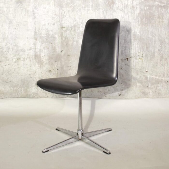 vintage swivel chair with chromed foot 1