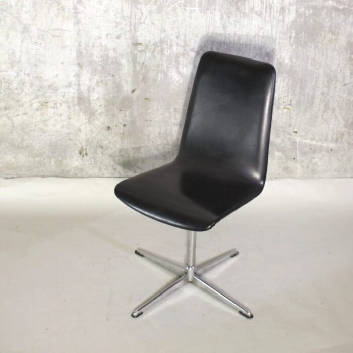 vintage swivel chair with chromed foot 2