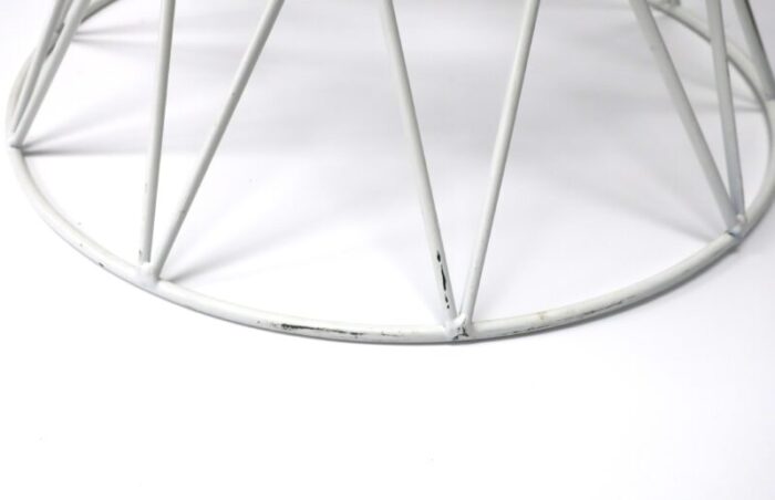 white metal side table with hourglass shape 5536